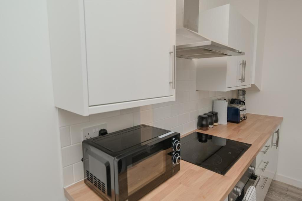 The House Apartment บาร์คกิ้ง ภายนอก รูปภาพ